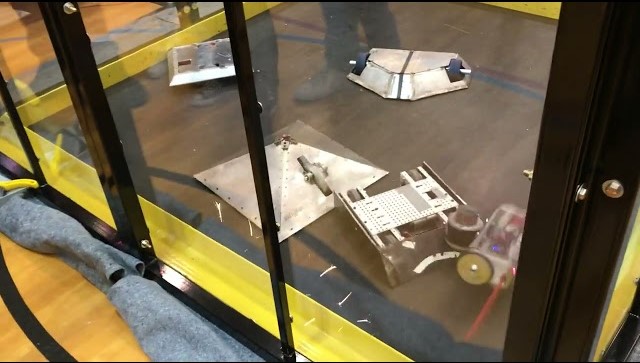 battle bots in a cage match